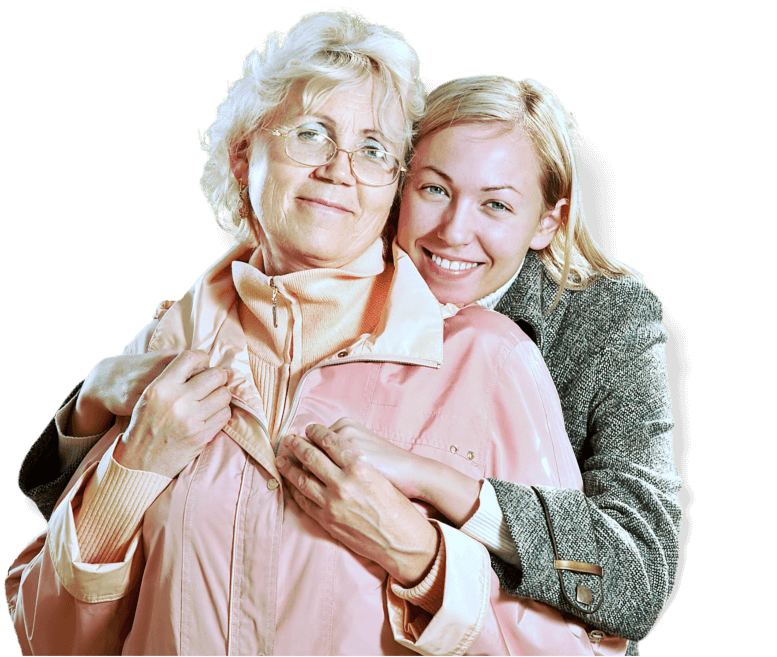 A caregiver embracing a smiling older woman